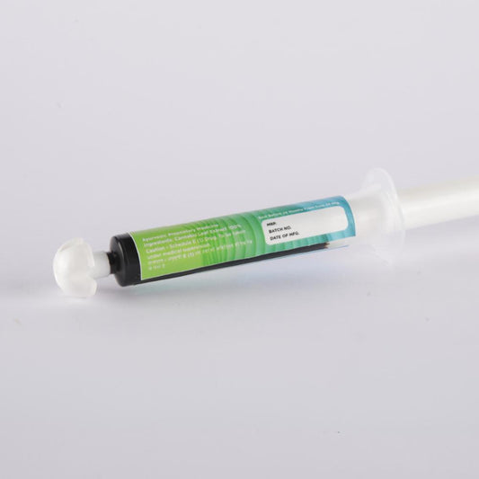 A syringe-shaped container clearly marked as containing a premium cannabis extract with a potency of 5000 milligrams.
