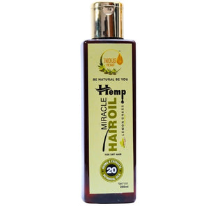 Bottle of Hemp Miracle Hair Oil on a white background