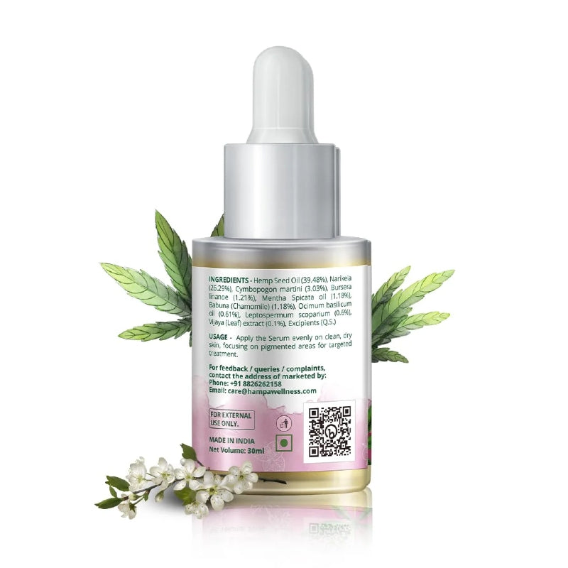 Bottle with dropper and cannabis leaves on a white background