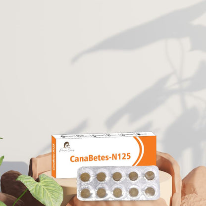 Blister pack of pills in front of a box labeled "CanaBetes-N125" with a plant shadow in the background.