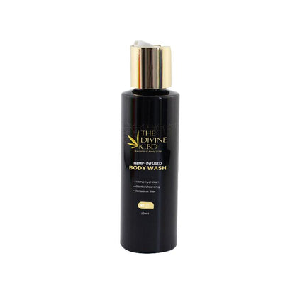 Black cylindrical bottle of "The Divine CBD" hemp-infused body wash with a gold pump dispenser.

