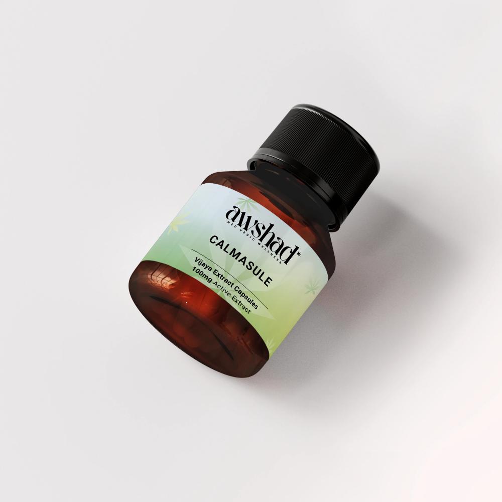 Bottle of "CALMASULE" capsules with label, on a white background.