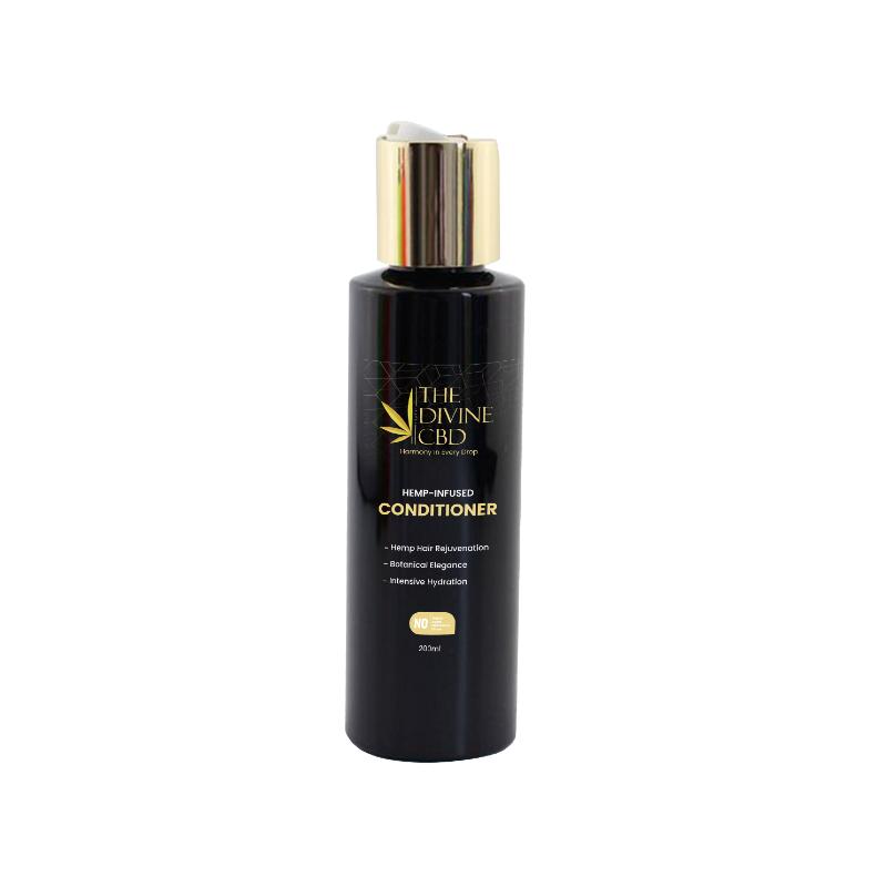 Black conditioner bottle with gold cap and label reading "THE DIVINE CBD Hemp-Infused Conditioner."

