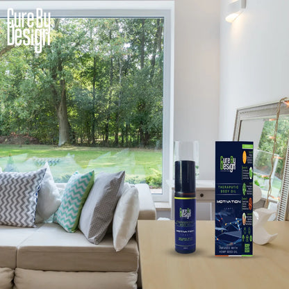 Product display of Cure by Design items on a table with a couch and window view in the background