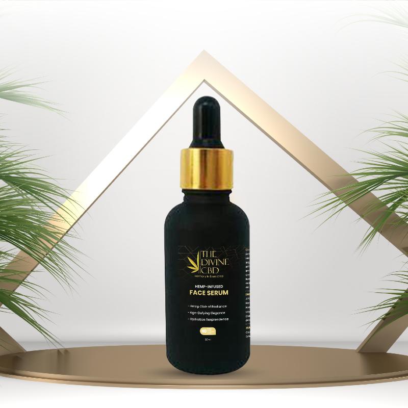 Black serum bottle with a gold cap and a dropper. "The Divine CBD" label. 