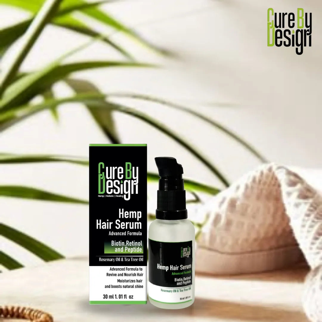 Cure By Design Hemp Hair Serum bottle and packaging on a neutral background with a plant.