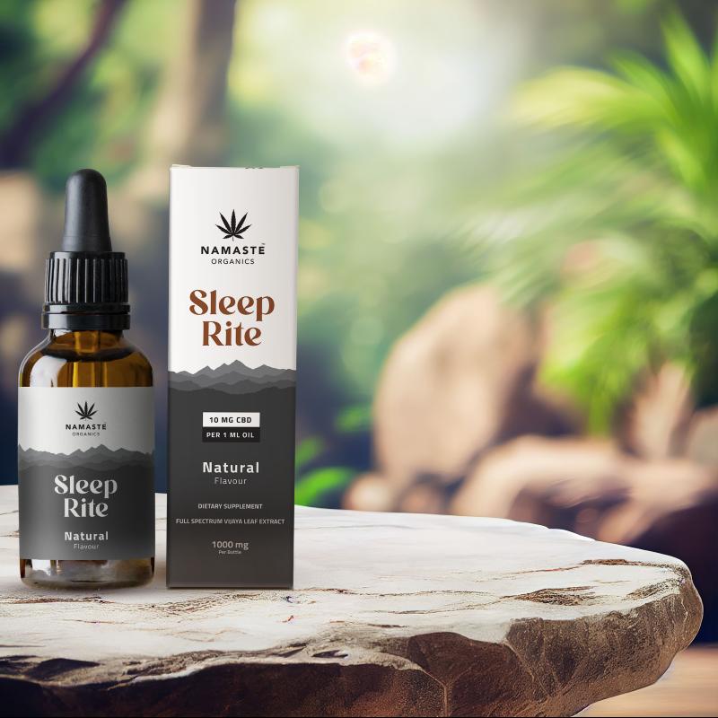 Namaste Organics Sleep Rite supplement bottle and packaging on a wooden surface with a natural background.