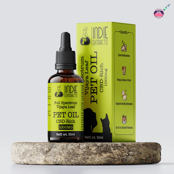 Indie Extracts Full-spectrum Vijaya Leaf Oil Bottle for Pets and packaging on a stone surface with a light gray background