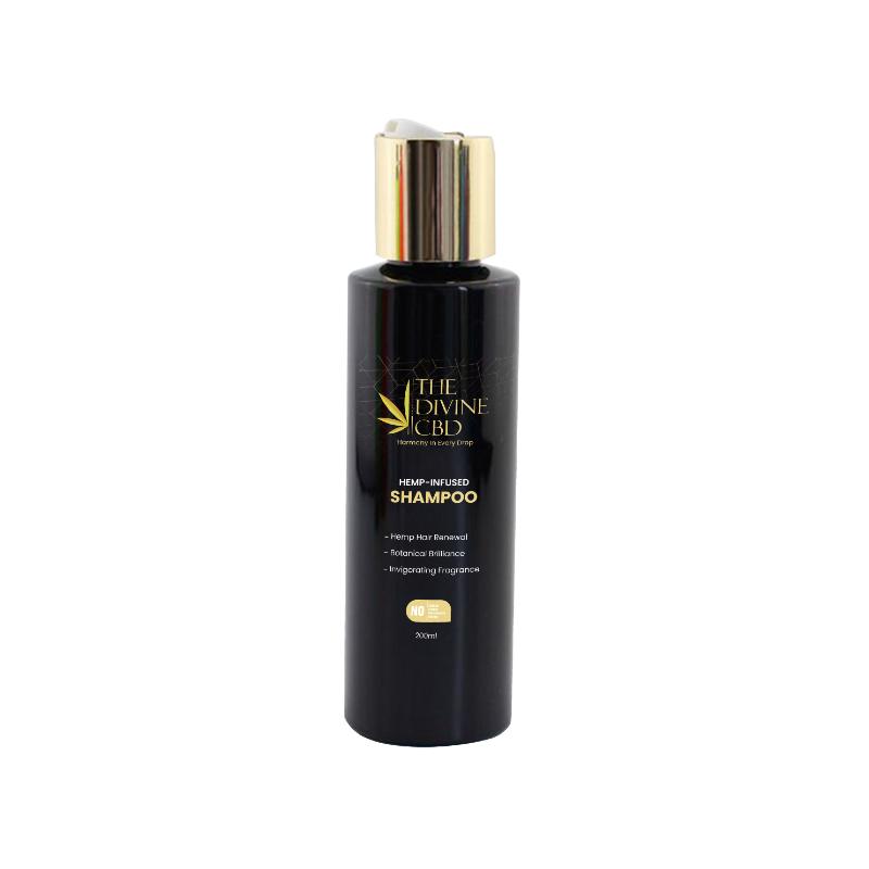 Black bottle of hemp-infused shampoo with gold cap and label.