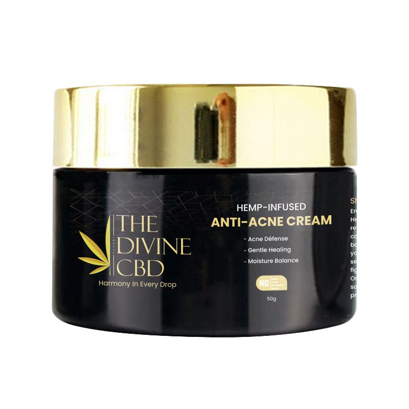  A container of "THE DIVINE CBD HEMP-INFUSED ANTI-ACNE CREAM" with a gold lid and dark glossy body.