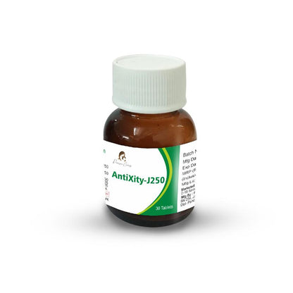 A small amber bottle of AntiXity-J250 tablets with a white label and cap.