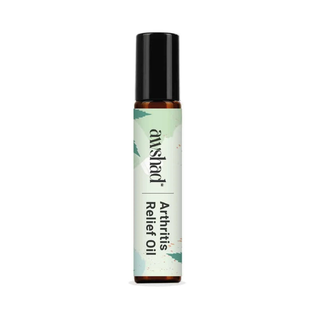 A bottle of Awshad Arthritis Relief Oil featuring a light-colored label and a black cap, associated with natural pain relief.