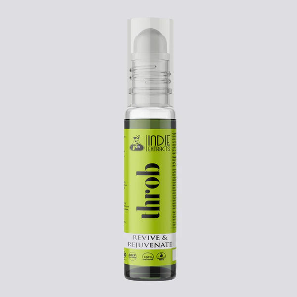 Green bottle with silver cap on a light gray background