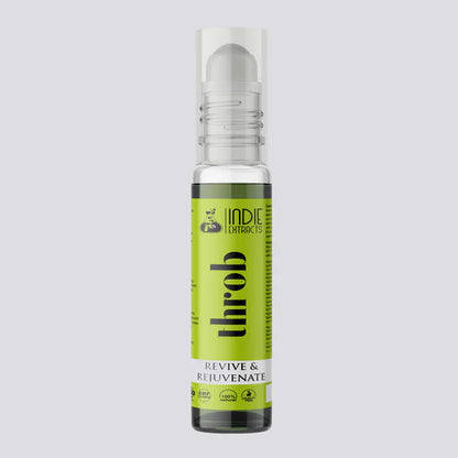 Green bottle with silver cap on a light gray background